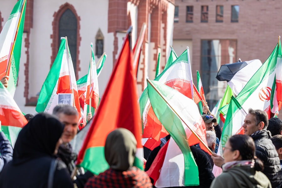 Tensions Rise as Iran Warns U.S. Amid Ongoing Israeli Strikes on Hezbollah